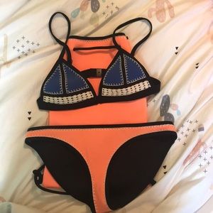 Real Triangl bathing suit with bag.